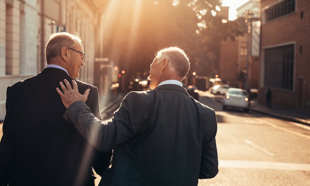 Business Professionals Walking on Sidewalk