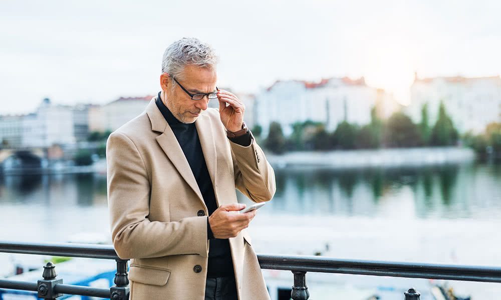 Man Checking Mobile Phone